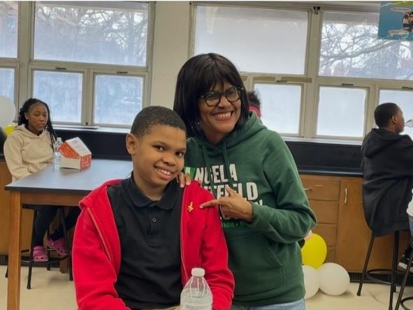  councilwoman calloway poses with student